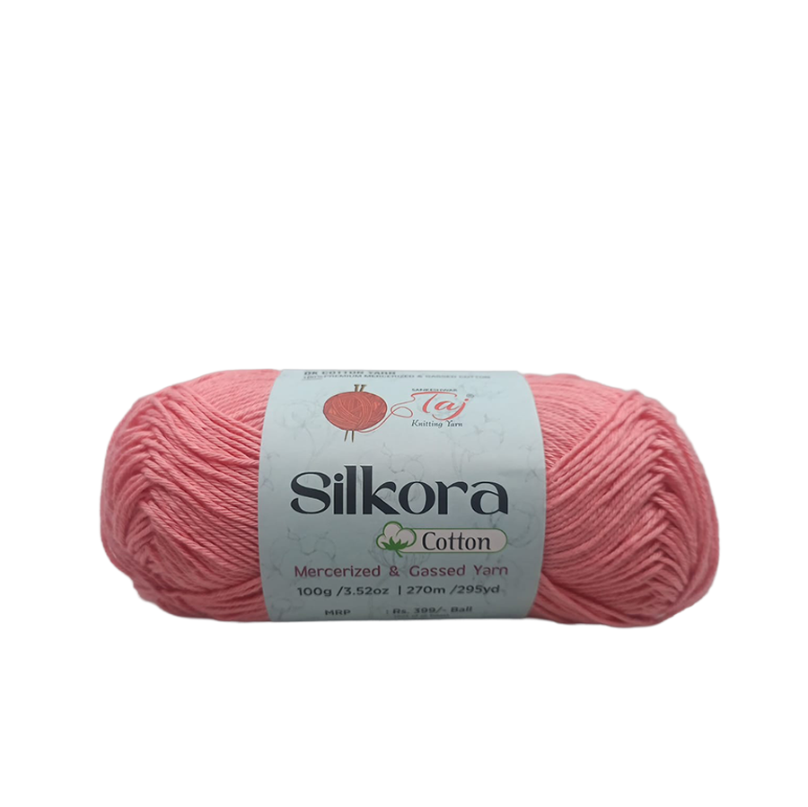 Pink skein of Silkora Cotton yarn on a white background