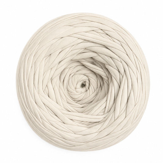 Beige skein of yarn on a white background