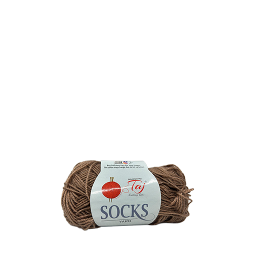 Ball of brown yarn with a label on a white background