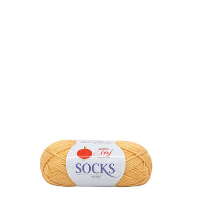 Ball of yellow yarn with a label on a white background