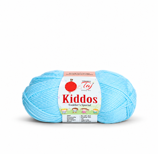 A light blue skein of yarn with a paper label reading 'Kiddos Toddler's Special' and the Taj brand logo, photographed on a clean white background.