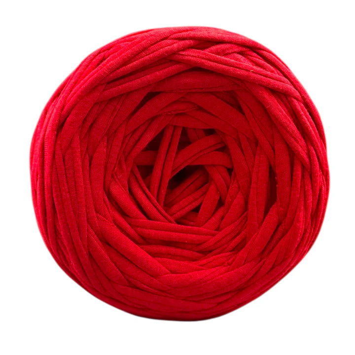 Red yarn ball on a white background