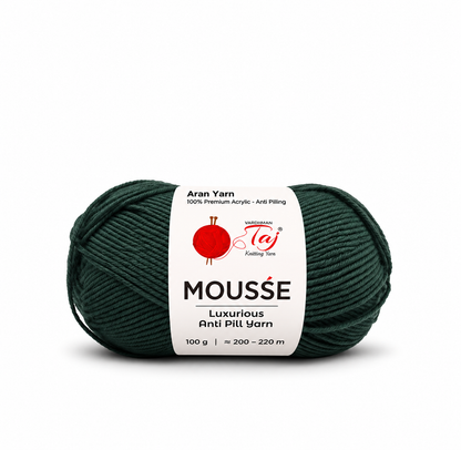 A single skein of Wessgarman Aran Yarn in the color Mousse, which is a deep forest green. The yarn is wrapped with a white paper label showing the brand logo and product details, set against a plain white background.