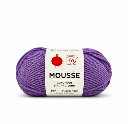 A ball of purple Mousse Anti Pill Yarn by Taj, featuring a white paper label with the Taj logo, on a clean white background.