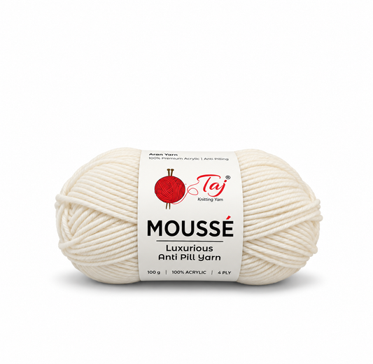 A single skein of Moussé luxurious anti-pill yarn in a warm cream/off-white shade, wrapped with a white paper label featuring a red yarn ball logo and black text, set against a plain white background.