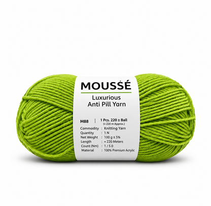 A skein of Moussé luxurious anti-pill yarn in a bright lime green color, featuring a white paper label with product details, set against a plain white background.