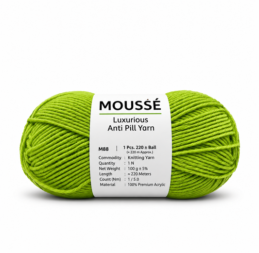A skein of Moussé luxurious anti-pill yarn in a bright lime green color, featuring a white paper label with product details, set against a plain white background.