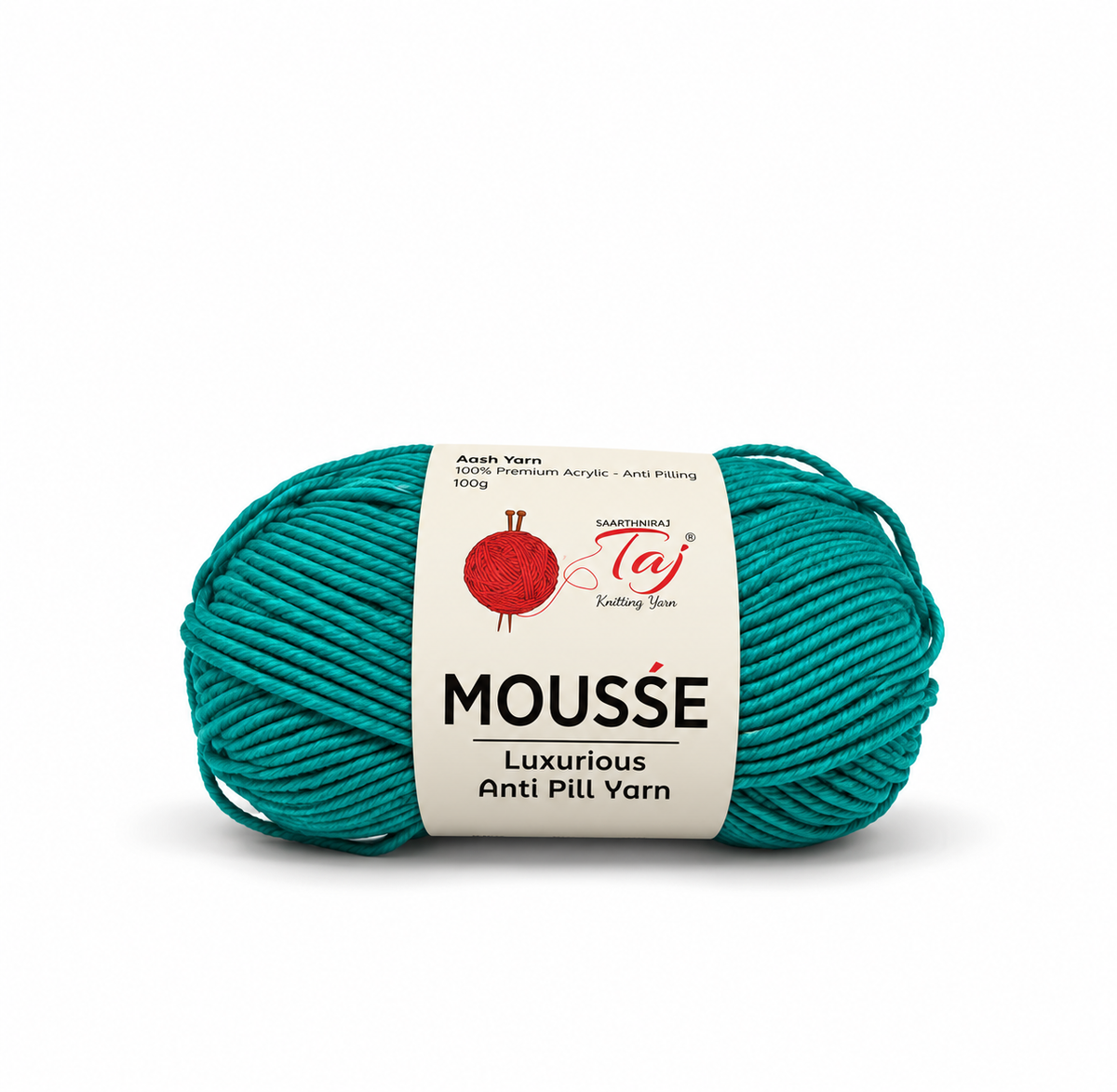 A skein of teal yarn with a white paper label that reads 'MOUSSE Luxurious Anti Pill Yarn' and shows the brand 'Taj' and 'Arts & Yarn'.