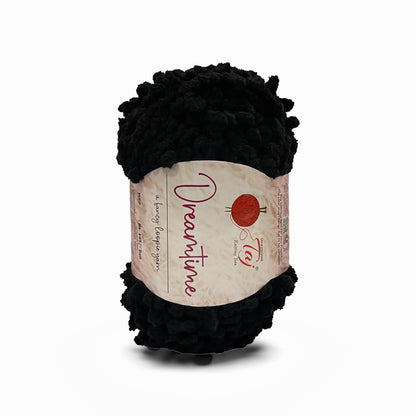 Black yarn ball with a label on a white background