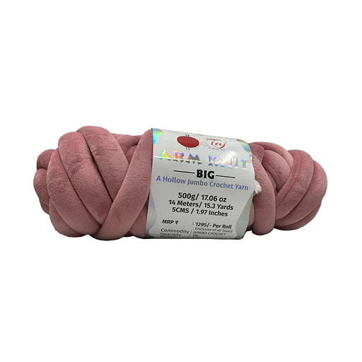 Pink yarn skein with a label on a white background