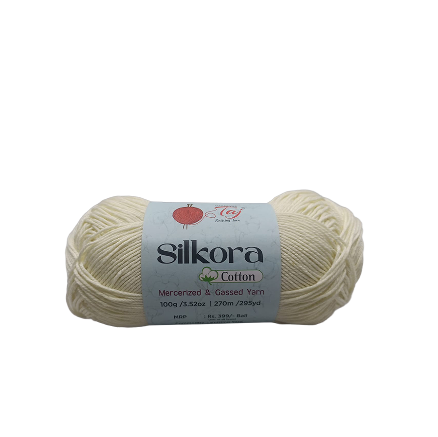 Ball of Silkora cotton yarn on a white background