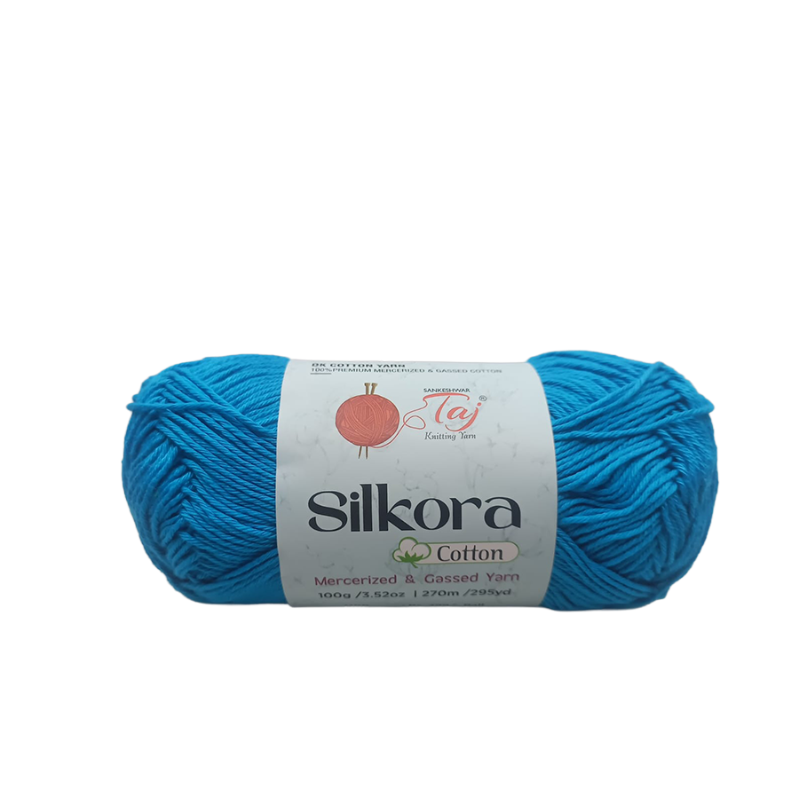 Blue skein of Silkora Cotton yarn on a white background